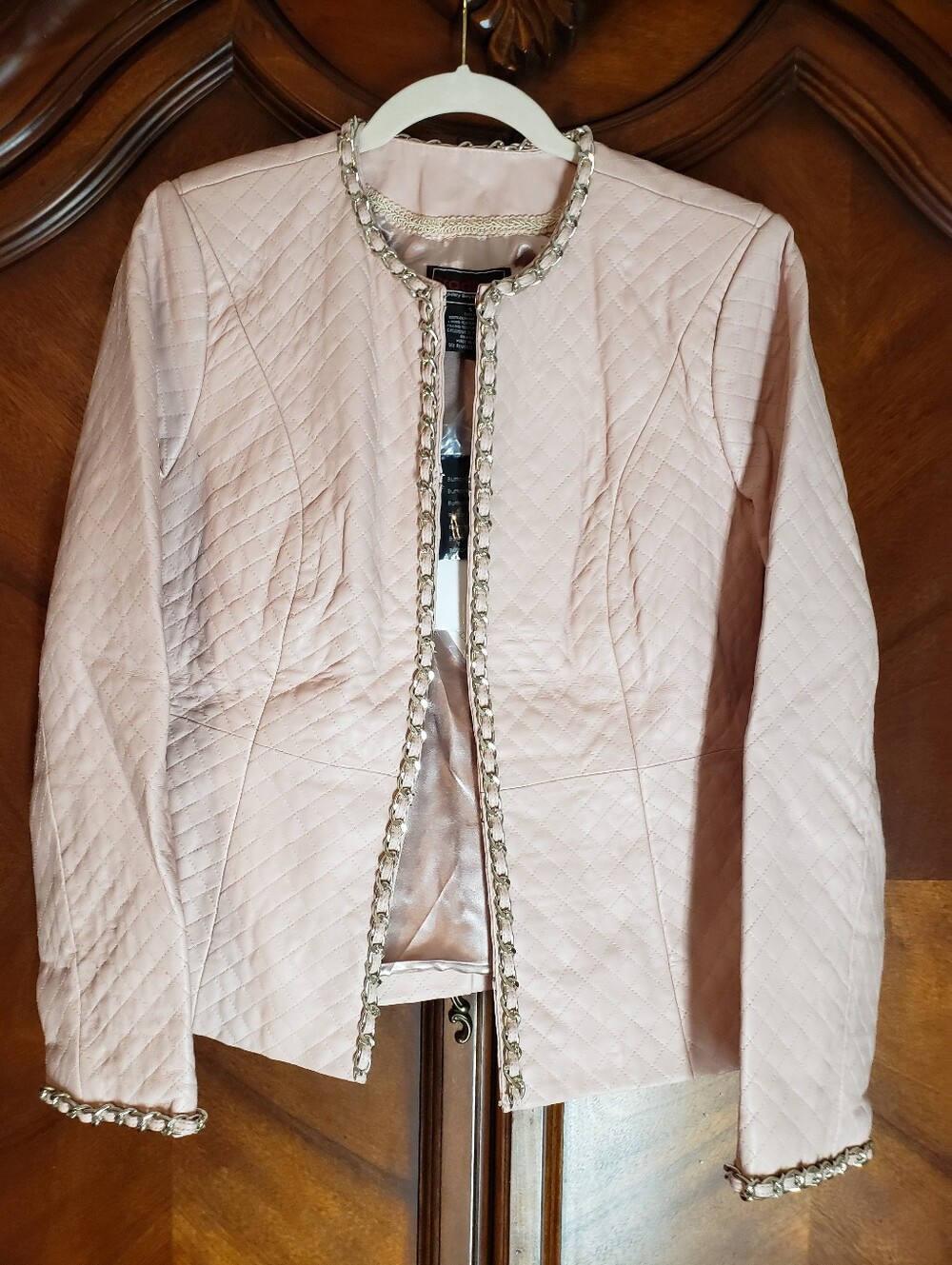 Elegant Quilted Pink Leather Jacket with Chain Trim
